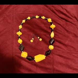 Chunky black and yellow necklace with matching earrings